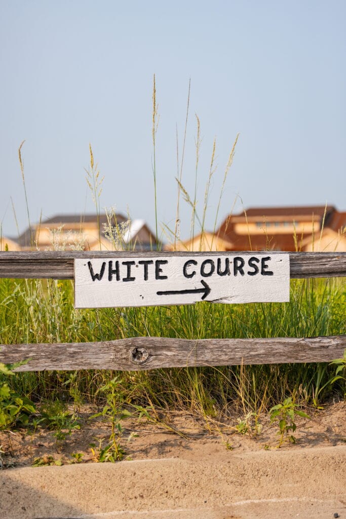 Handmade sign pointing to the White Course at Dismal River.